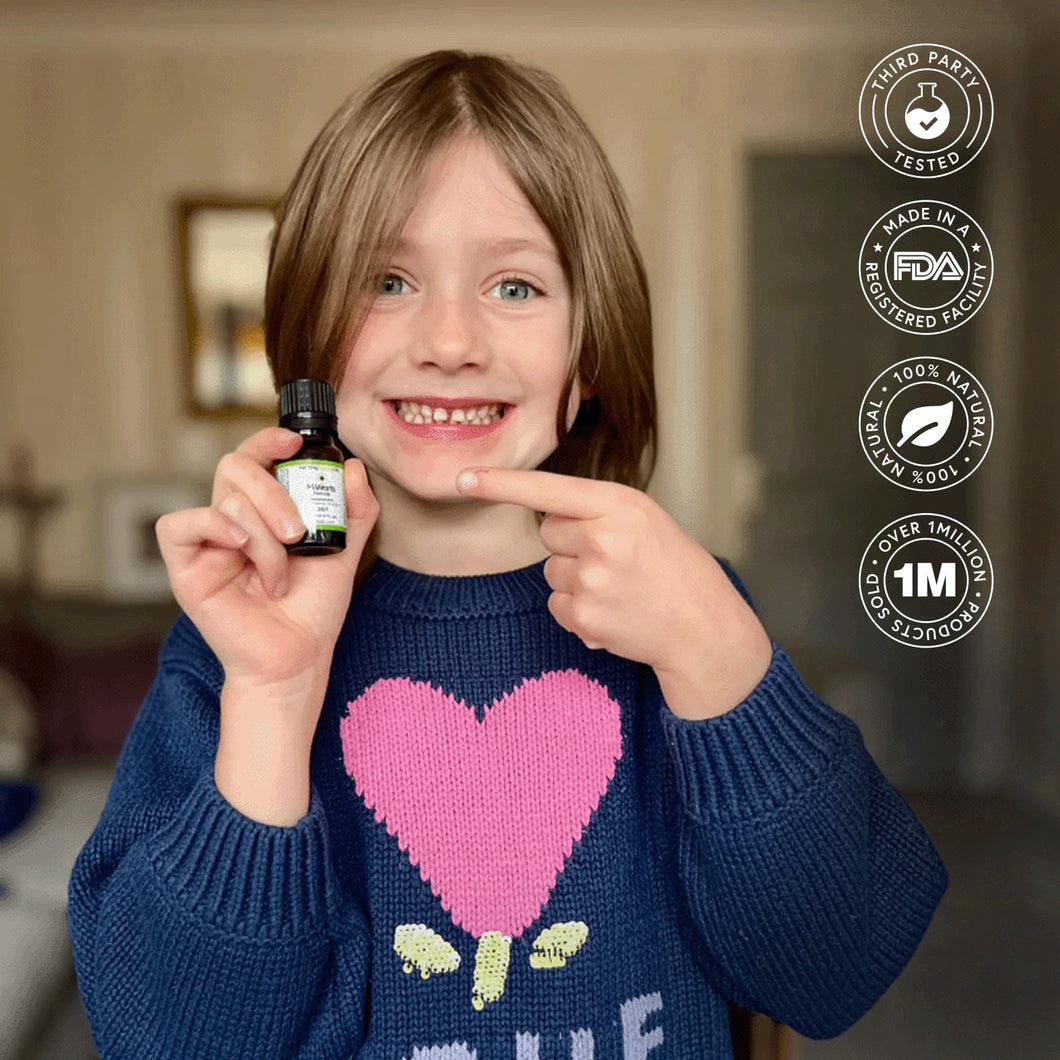 Smiling child holding H-Warts Formula natural wart removal product,.Highlights third-party tested, 100% natural, over 1 million sold; effective for common, plantar, flat, facial, body, and nail warts.
